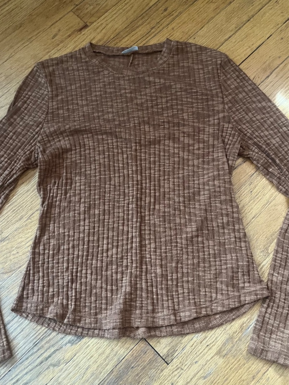 Free People Aura Layering Top in a warm brown ribbed knit.